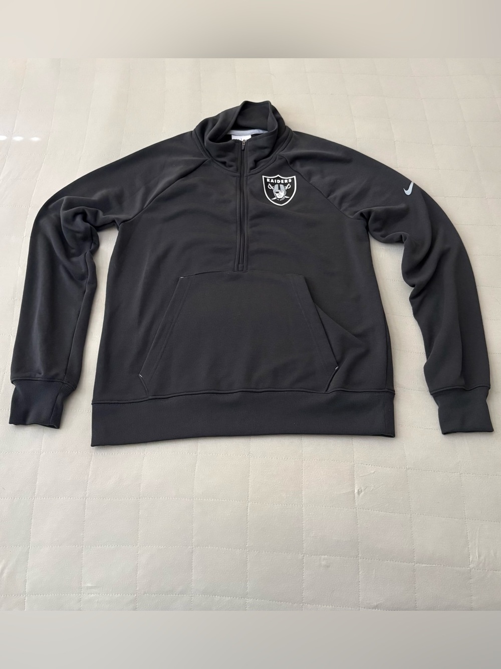 NFL Black Half-Zip Performance Pullover with Team Shield